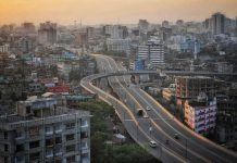 Highway snakes through a city in Bangladesh