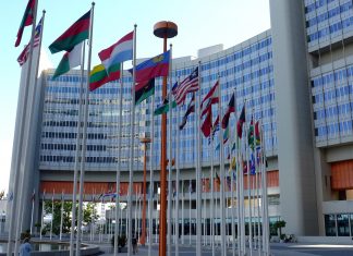 United Nations building with flags flying
