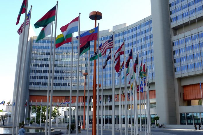 United Nations building with flags flying